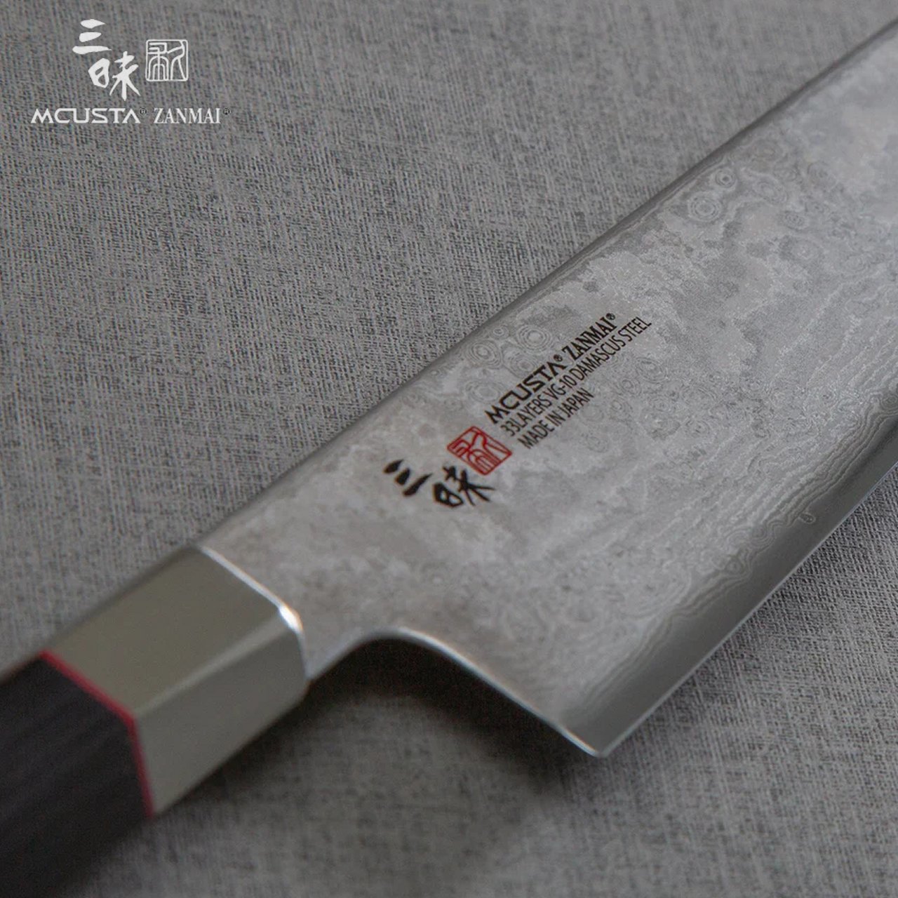 Coltello Santoku 18 cm Mcusta Zanmai Hybrid Damascus Splash HZ2-3003DS - immagine 5