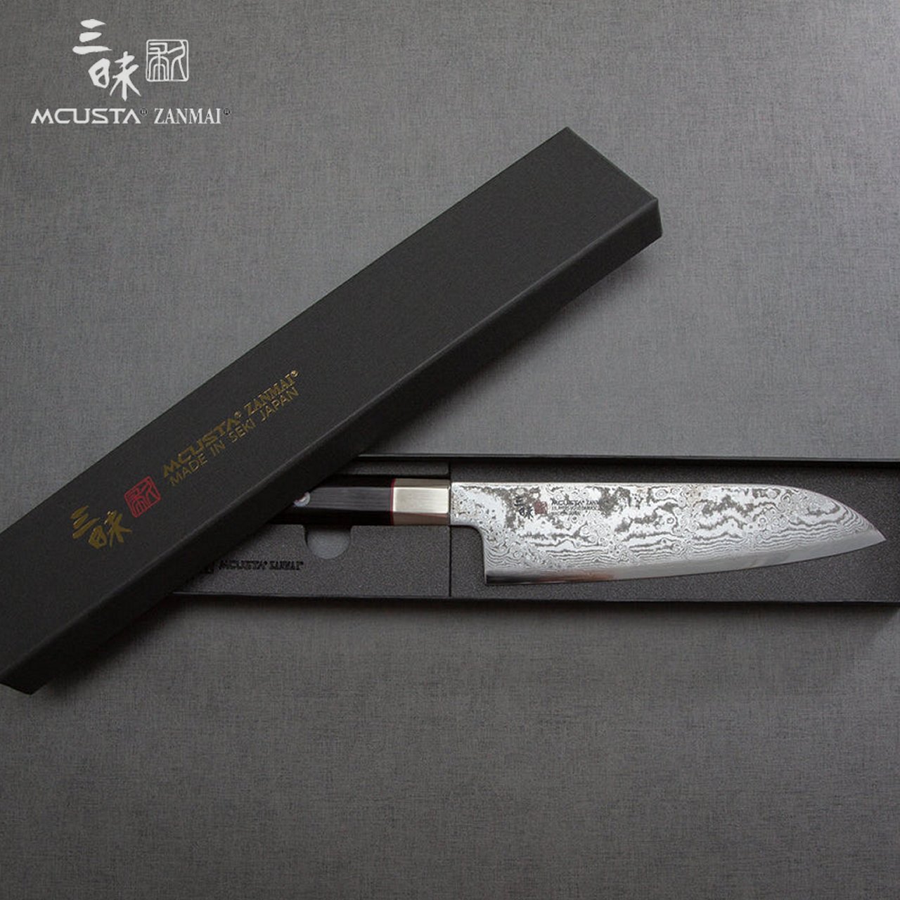 Coltello Santoku 18 cm Mcusta Zanmai Hybrid Damascus Splash HZ2-3003DS - immagine 6